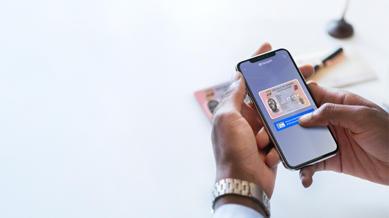 User with mobile scanning his ID